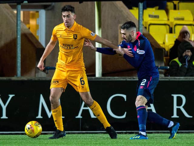 Michael Smith battles for the possession the last time Hearts travelled to West Lothian. Picture: SNS