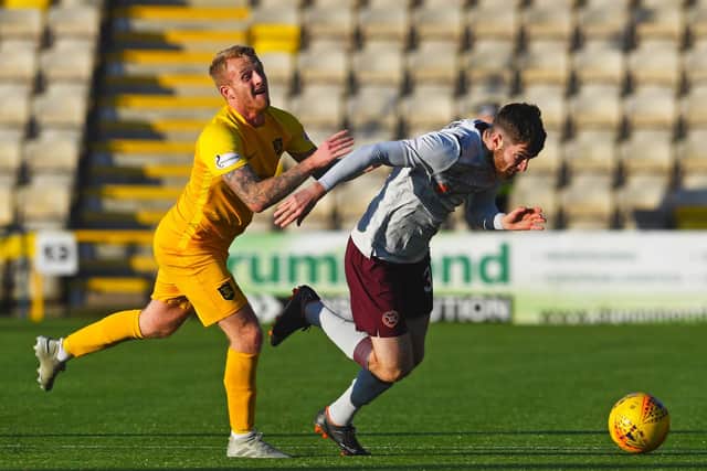 Aidan Kenna in possession for Hearts late in Saturday's game. Picture: SNS