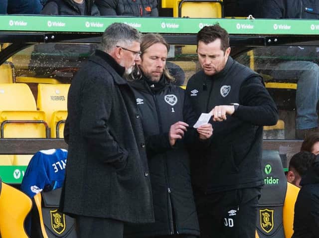 Hearts manager Craig Levein, assistant Austin MacPhee and coach Jon Daly in discussion during Saturday's 0-0 draw at Livingston