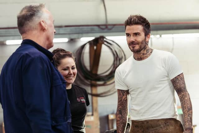 David Beckham with coopering staff.