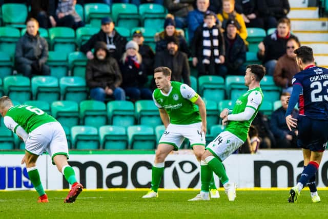 Joe Chalmers, right, equalises for Ross County at Easter Road. Picture: SNS