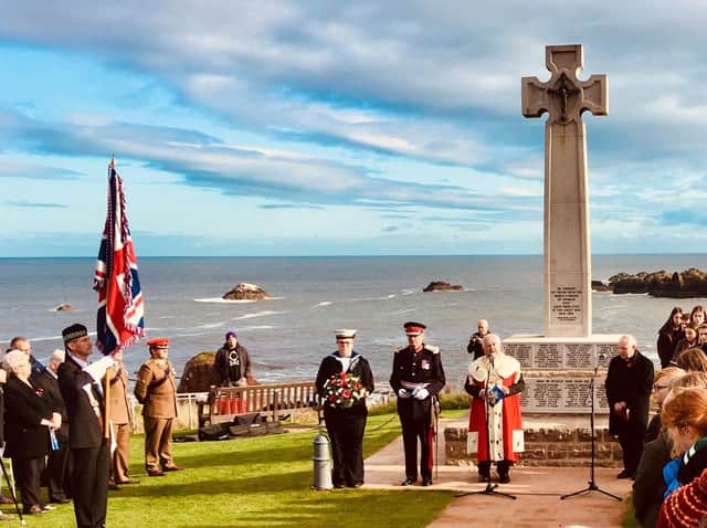 The 'forgotten' war dead are remembered at last in a ceremony at the memorial.