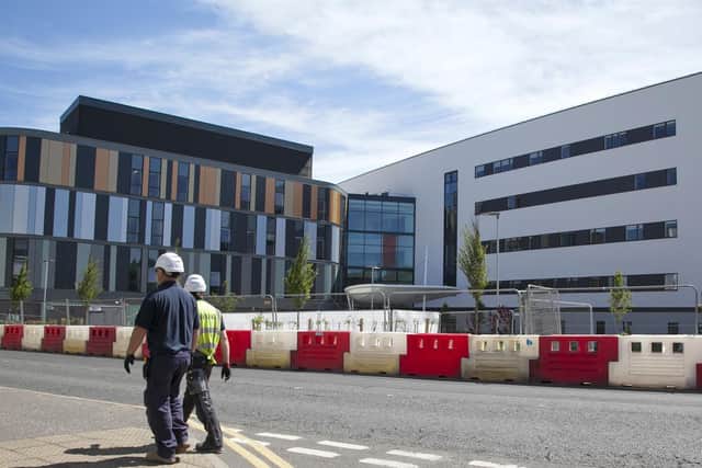 The new hospital should have opened in July but has now been delayed until autumn next year.