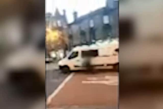 Video footage shows a cyclist being knocked off his bike by a van driver