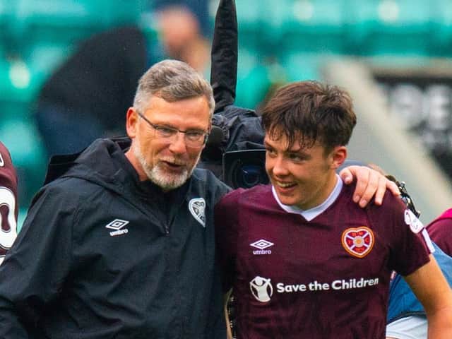 Craig Levein celebrates with Aaron Hickey at the end of the Edinburgh derby in September - Levein's last league win as Hearts boss