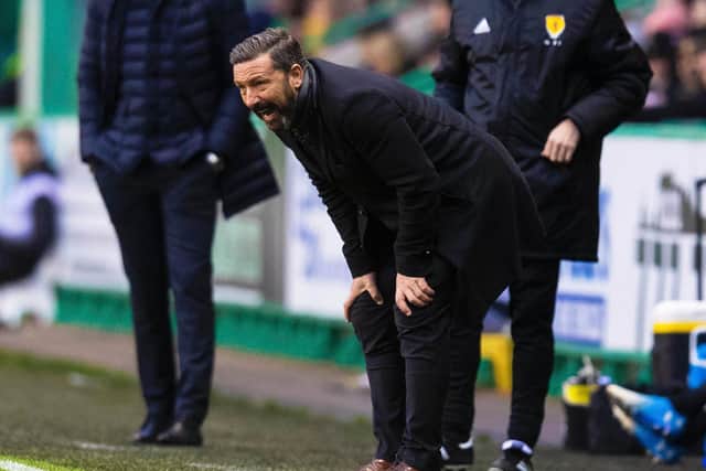 Derek McInnes looks on as his team fall to a 3-0 defeat at Easter Road