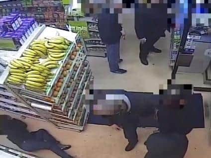 The shop's CCTV captures the attack