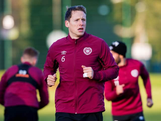 Christophe Berra is a doubt for Hearts' clash with Celtic. Pic: SNS