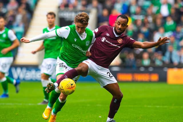Scott Allan and Loic Damour battle for possession during the last meeting between the sides. Picture: SNS