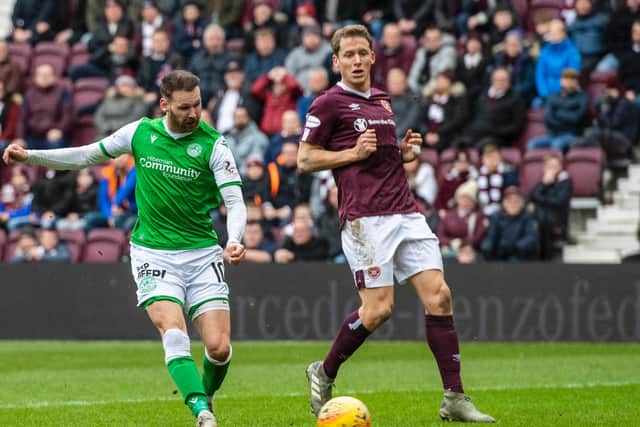 Martin Boyle tucks away his second goal of the game for Hibs. Picture: SNS