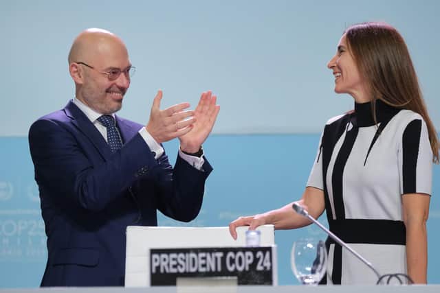 Michal Kurtyka, Polish Climate Minister and President of the UN's Conference of the Parties 24, applauds Chilean Environment Minister Carolina Schmidt after she officially took on the COP25 presidency at the opening day of the global climate conference (Picture: Sean Gallup/Getty Images)