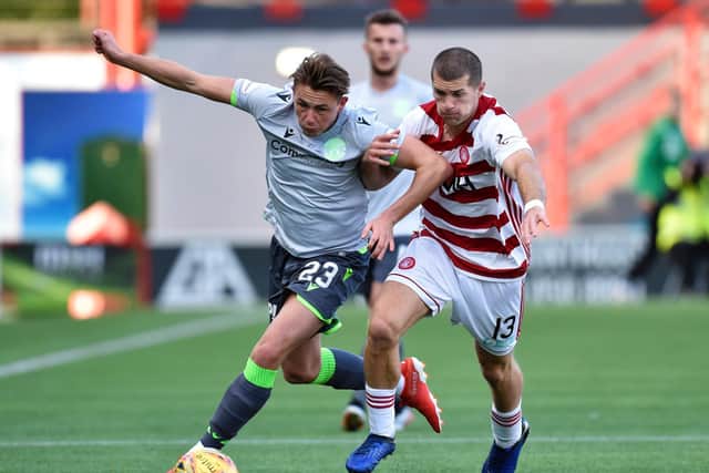 Scott Allan in action against Hamilton's Alex Gogic during the last match between the sides. Picture: SNS