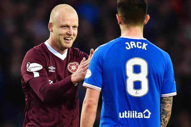 Steven Naismith and Ryan Jack during the Betfred Cup semi-final between the sides. Picture: SNS