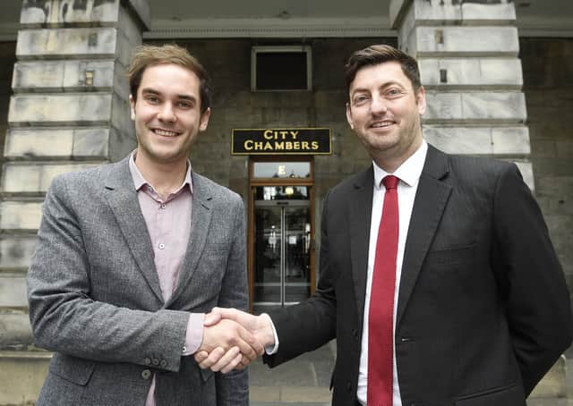 Adam McVey and Cammy Day shake on the council coalition deal between the SNP and Labour in June 2017 (Picture: Greg Macvean)