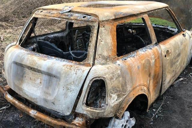 The shell of the burnt out Mini car. Pic: Shiv Das.