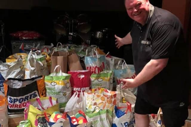 Andy's band have seen more than a hundred bags of shopping donated thanks to promoters who have put on Food Bank Skanks