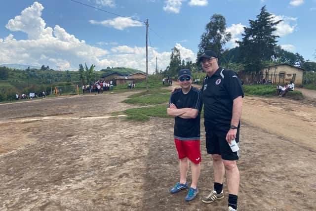 David Hamilton and Davie Fairgrieve at the school football pitch - which is on top of a mountain.