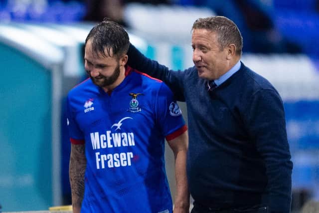 Former Hibs striker James Keatings with Inverness manager John Robertson. Picture: SNS