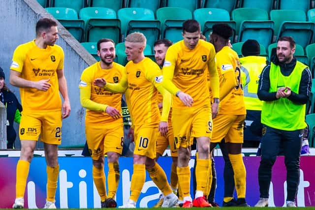 Livingston's players celebrate after scoring at Easter Road. Picture: SNS