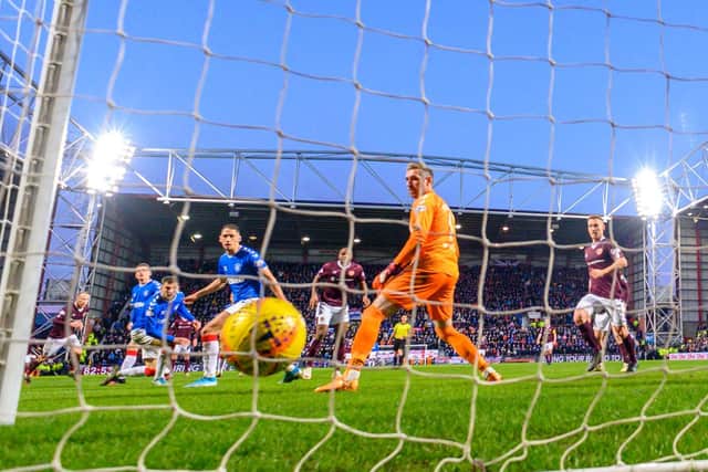 Liam Boyce finds the back of the net as Hearts defeat Rangers in the last meeting between the clubs. Picture: SNS
