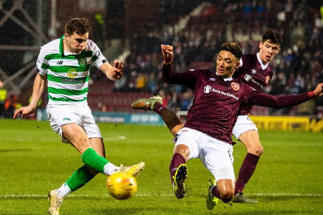 Sean Clare goes to block a shot by Celtic's James Forrest during the last meeting between the clubs. Picture: SNS