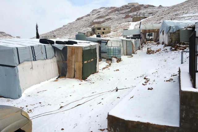 Snow-covered tents in Arsal.