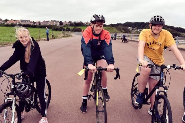 Team Reece cycle ride along Morecambe promenade. Pictured are Niamh, Max and Oscar.
