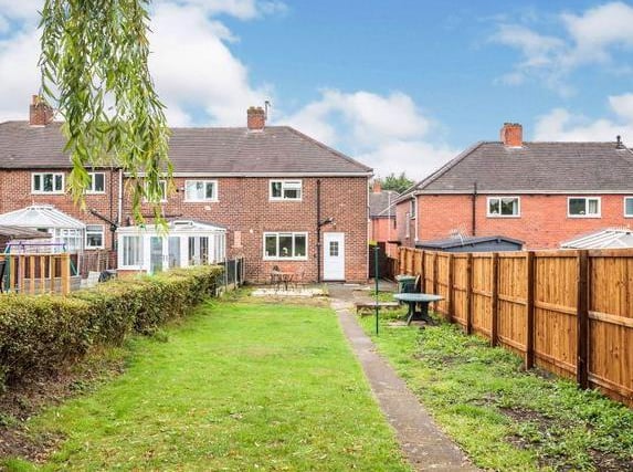 The long rear garden has an open aspect over the playing fields, a paved patio area, lawned gardens, security lighting, a paved pathway to the far end, timber framed shed, pathway down the side of the property and right of access to the rear. Off road parking to the front of the property.