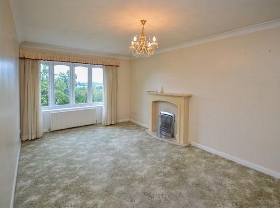 The accommodation briefly comprises entrance hall, kitchen, lounge, three bedrooms and shower room/w.c. Outside, there are gardens to both the front and rear with a paved driveway providing off street parking leading to the garage.