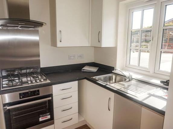 The kitchen/dining room comes with a selection of wall and base units with a stainless steel sink and drainer. An electric oven and gas hob with extractor fan. Space and plumbing for a washing machine. Space for a freestanding fridge/freezer.