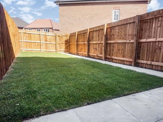 To the rear of the property is an enclosed garden with a patio area and lawn. There is an outside water supply, outside lighting, an electric car charging point and off-road parking