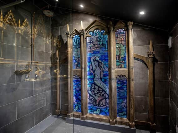 The mermaid stained glass window mirrors the common room in the Gryffindor house from the Harry Potter films. (Credit: Charlotte Graham)