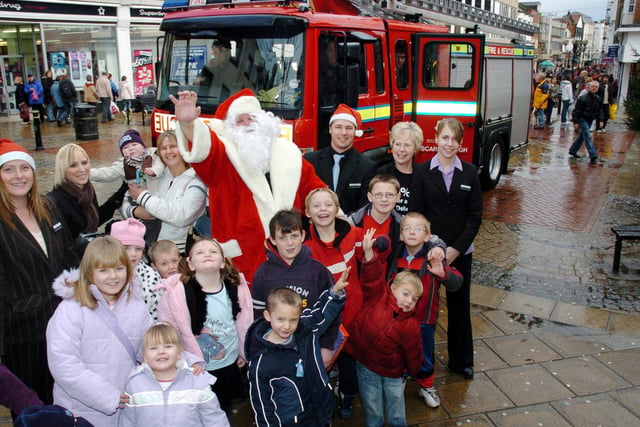 Debenhams Santa arrives at the Brunswick Centre in a fire engine from Red watch at Scarborough Fire Station.