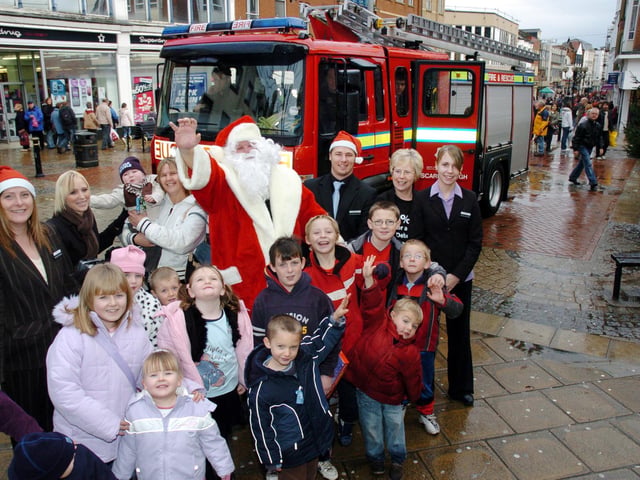 Debenhams Santa arrives at the Brunswick Centre in a fire engine from Red watch at Scarborough Fire Station.