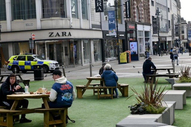 Police cars could be seen on Briggate as the new laws came into place - and officers have the power to fine people who break the rules.