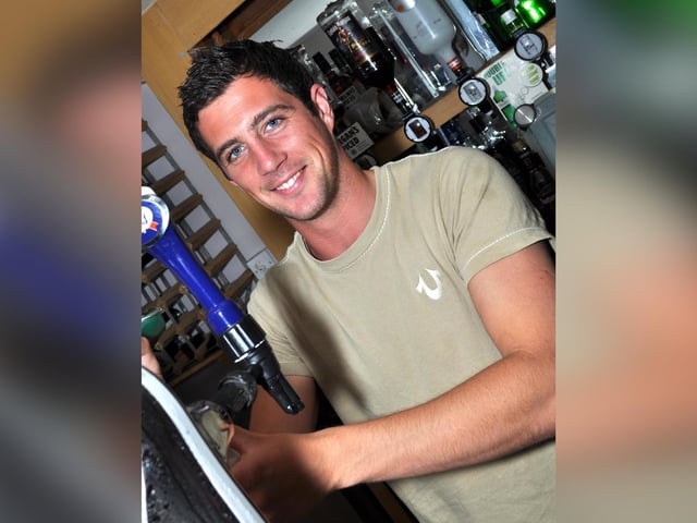 Barman Gaz pours a drink in 2011.