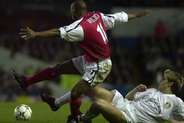 Sylvain Wiltord of Arsenal challenged by Jonathan Woodgate