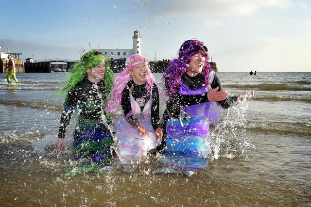 Mermaids having fun at the New Year's Day Dip on Scarborough's South Bay.