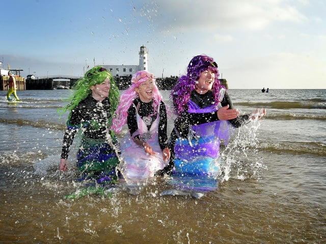 Mermaids having fun at the New Year's Day Dip on Scarborough's South Bay.