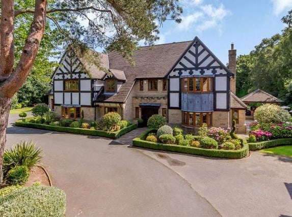 This seven bedroom house is in Manor House Lane in Alwoodley. It also boasts seven bathrooms, seven reception rooms, a private swimming pool and gym and an independent apartment.