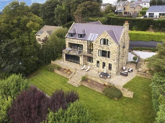 The beatufiul Kites Nest sits in Highfield Drive in Rawdon. It has five bedrooms, five bathrooms and three reception rooms. It has magnificent elevated/panoramic views across the valley and beyond.