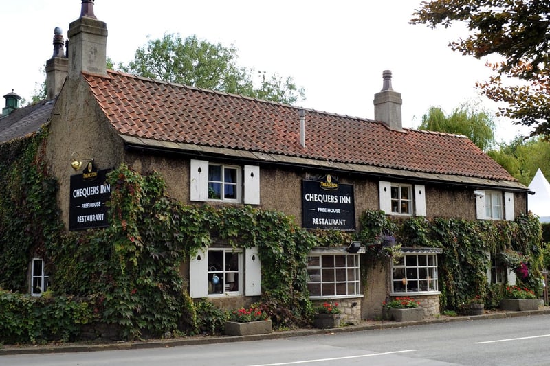 The historic Chequers Inn is nestled in the picturesque village of Ledsham and dates back to the early 1600s.
