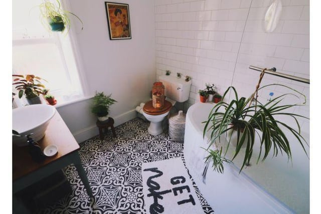 The house bathroom has also been recently renovated. It has beautiful black and white flooring with crisp white tiling.