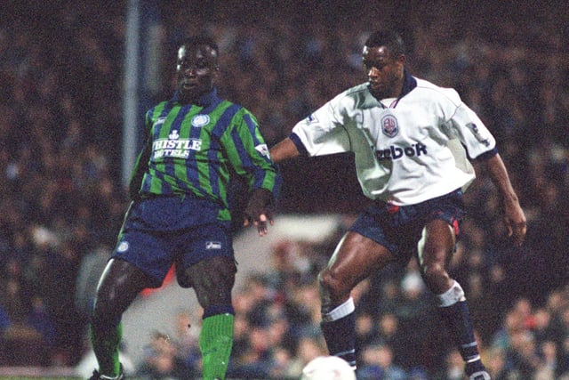 Tony Yeboah tackles Bolton defender and former Whites star Chris Fairclough during the FA Cup fourth round clash at Burnden Park in February 1996. Leeds won 1-0.
