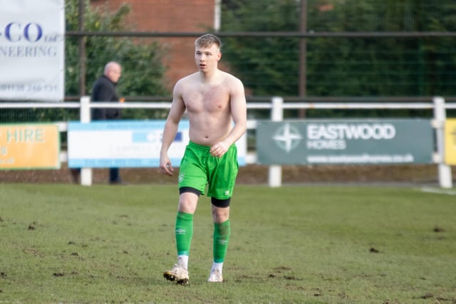 Shirtless Sam Kelly walks off after handing his goalkeeper's jersey over to Joe Jagger after being sent-off. Picture: Mark Parsons