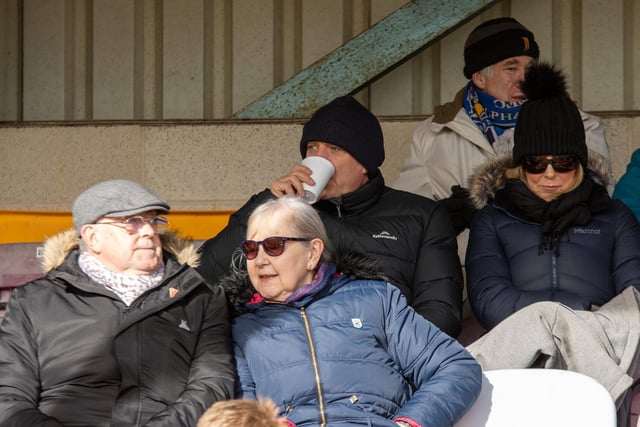 Supporter in the stand ahead of the game. Picture: Mark Parsons