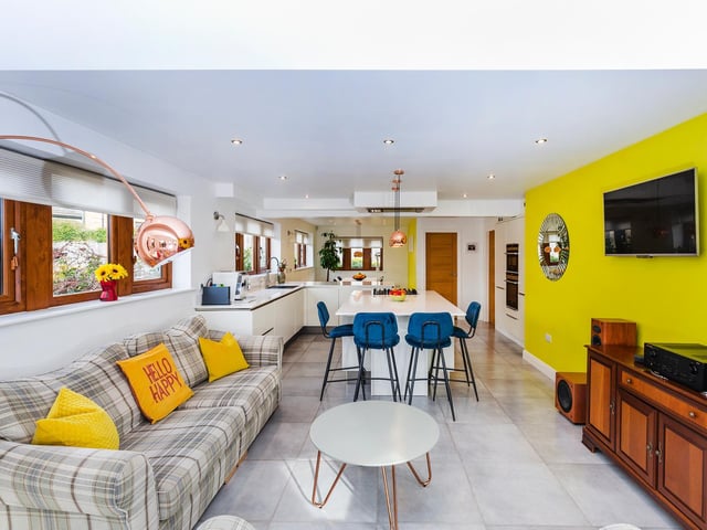 Flow through kitchen, living and dining areas for families