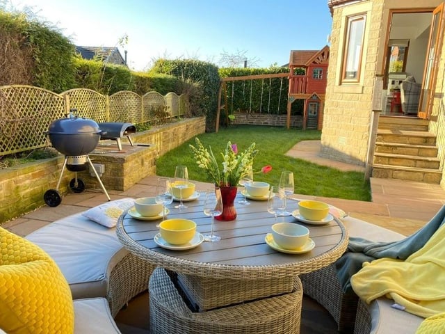 A sheltered and private patio on which to enjoy the summer sun.