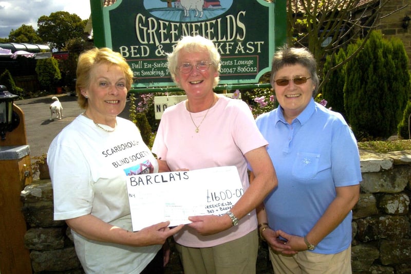 Whitby Blind and Partially Sighted Society receives a donation.