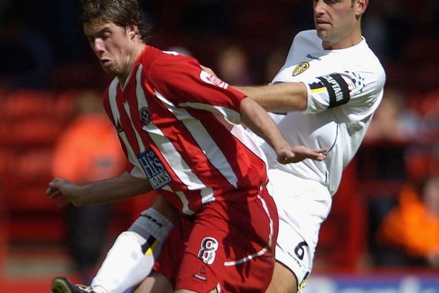Sheffield United's Andy Gray shields the ball from Paul Butler during the  Championship clash at Bramall Lane in August 2004.